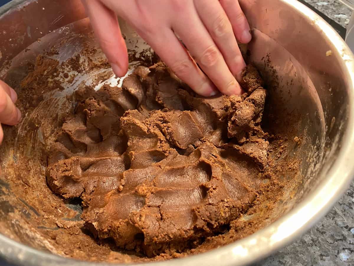 lucie-making-cookies playing with chocolate brownie cookie dough