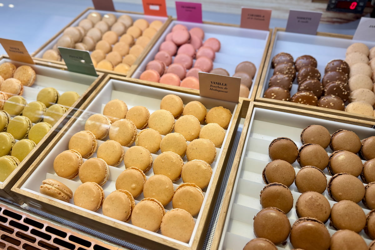 vanilla and hazelnut macarons displayed at Lenotre Paris